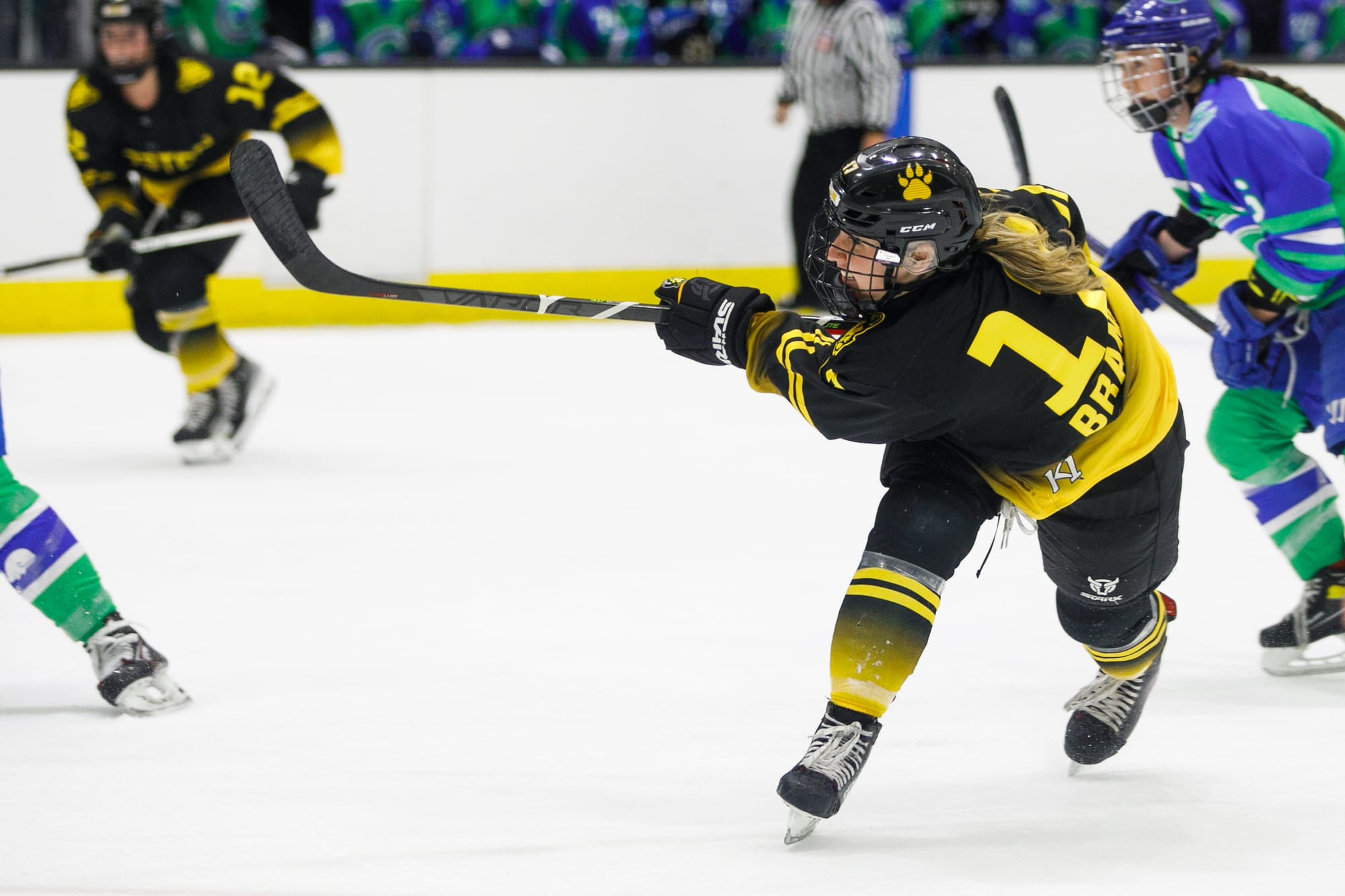 McKenna Brand follows through on a shot during a Boston Pride game.