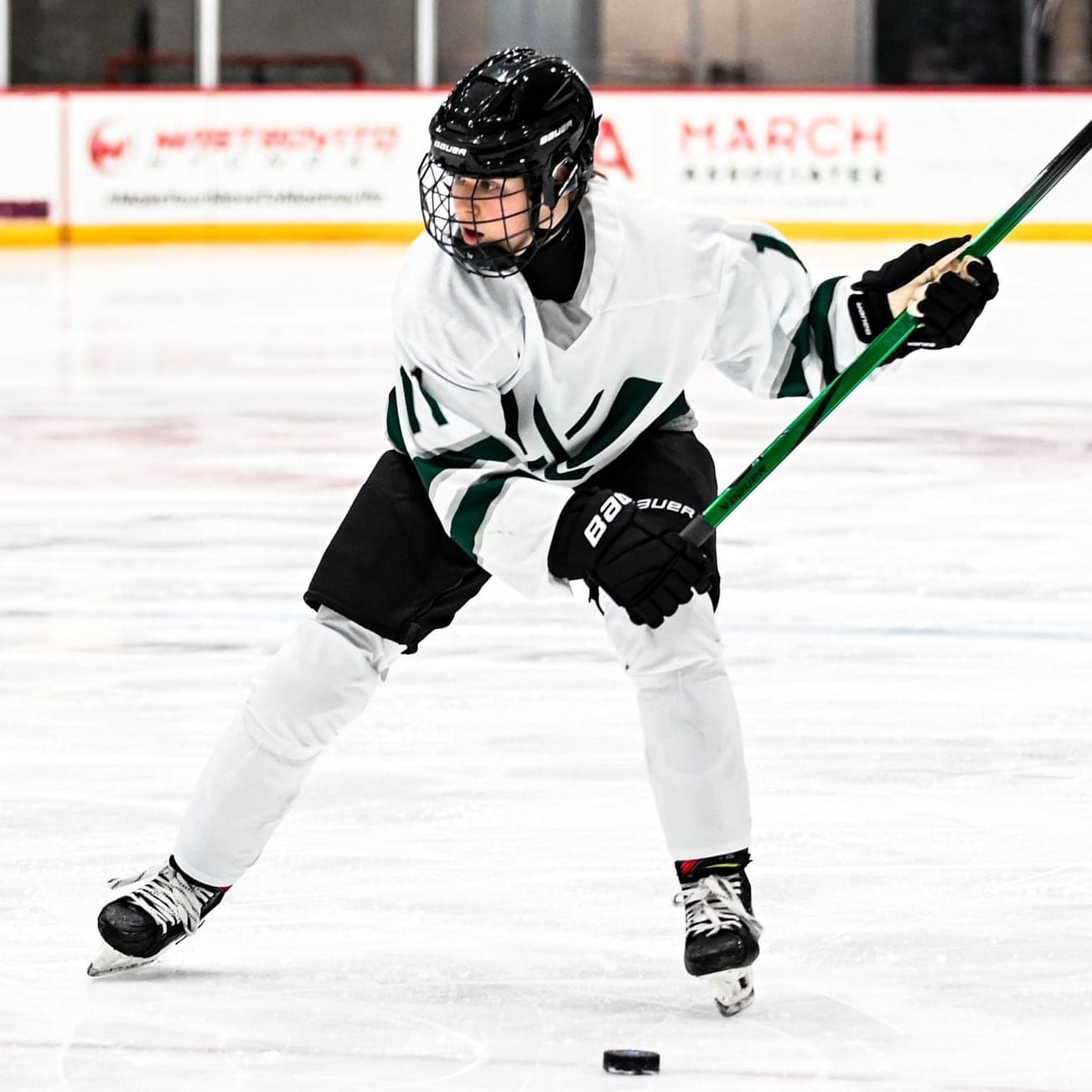 Alina Mรผller winds up for a slap shot during a PWHL pre-season game.