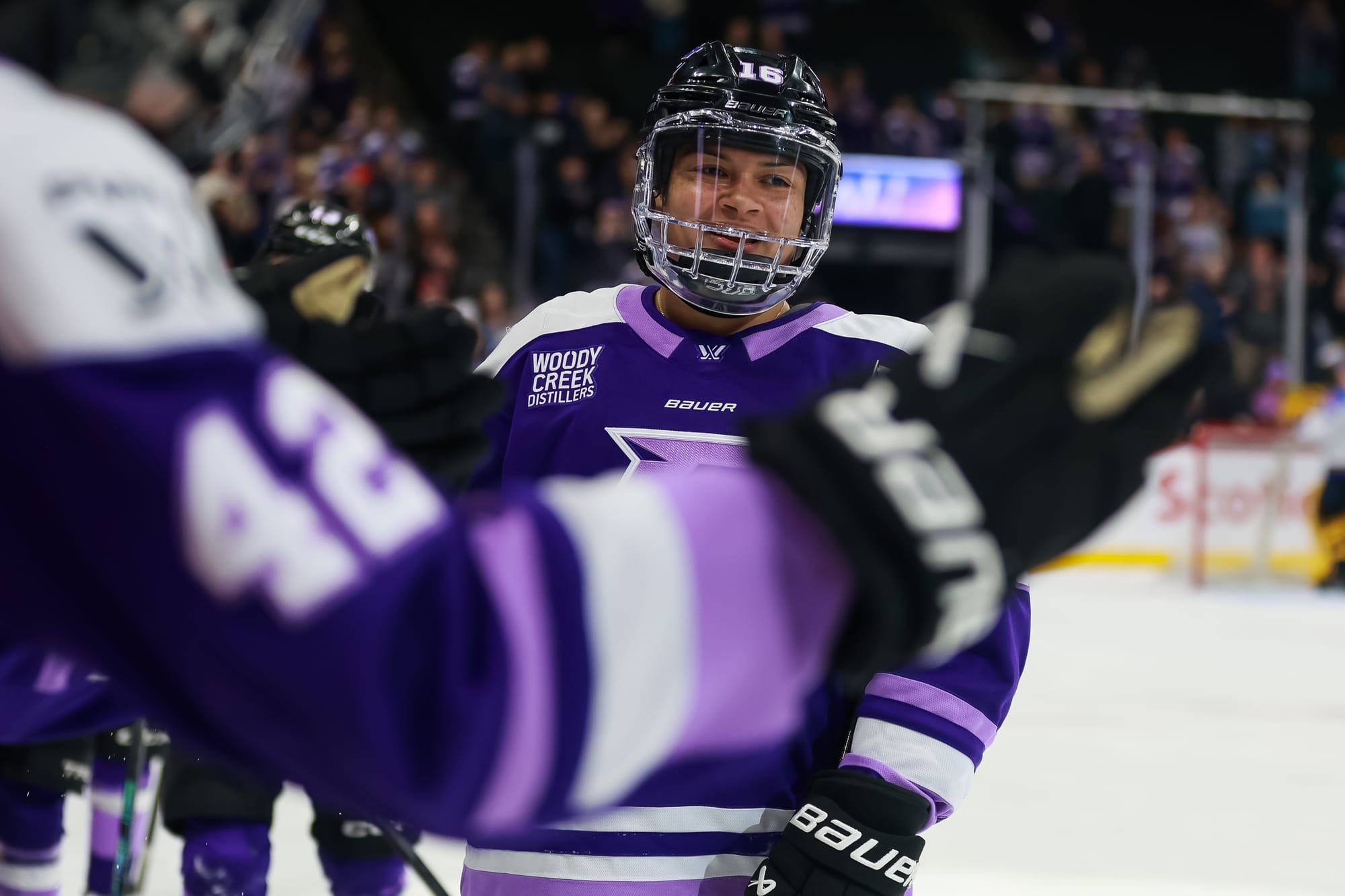 Sophie Jaques celebrates with bench