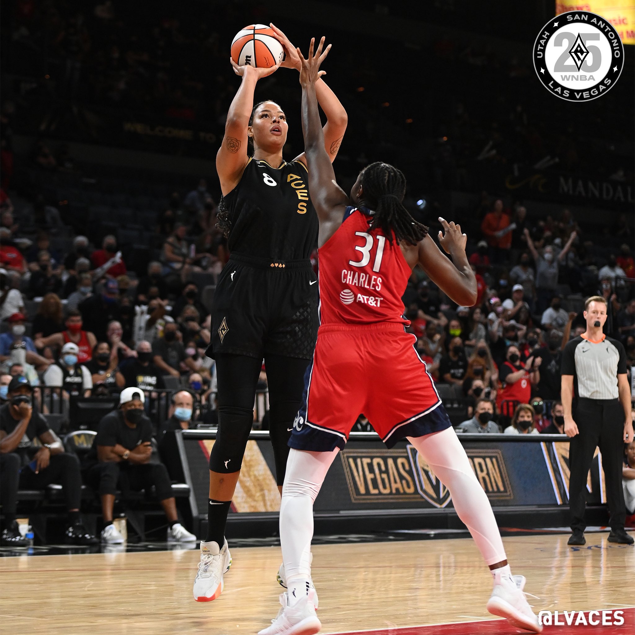 Aces' Liz Cambage takes a shot over Mystics' Tina Charles. Photo via Twitter, @LVAces.
