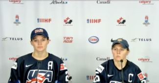 USA CAPTAINS LEE STECKLEIN (LEFT) AND KENDALL COYNE SCHOFIELD TALK TO MEDIA AFTER A 5-1 LOSS TO CANADA. AUGUST 26, 2021, CALGARY, ALBERTA