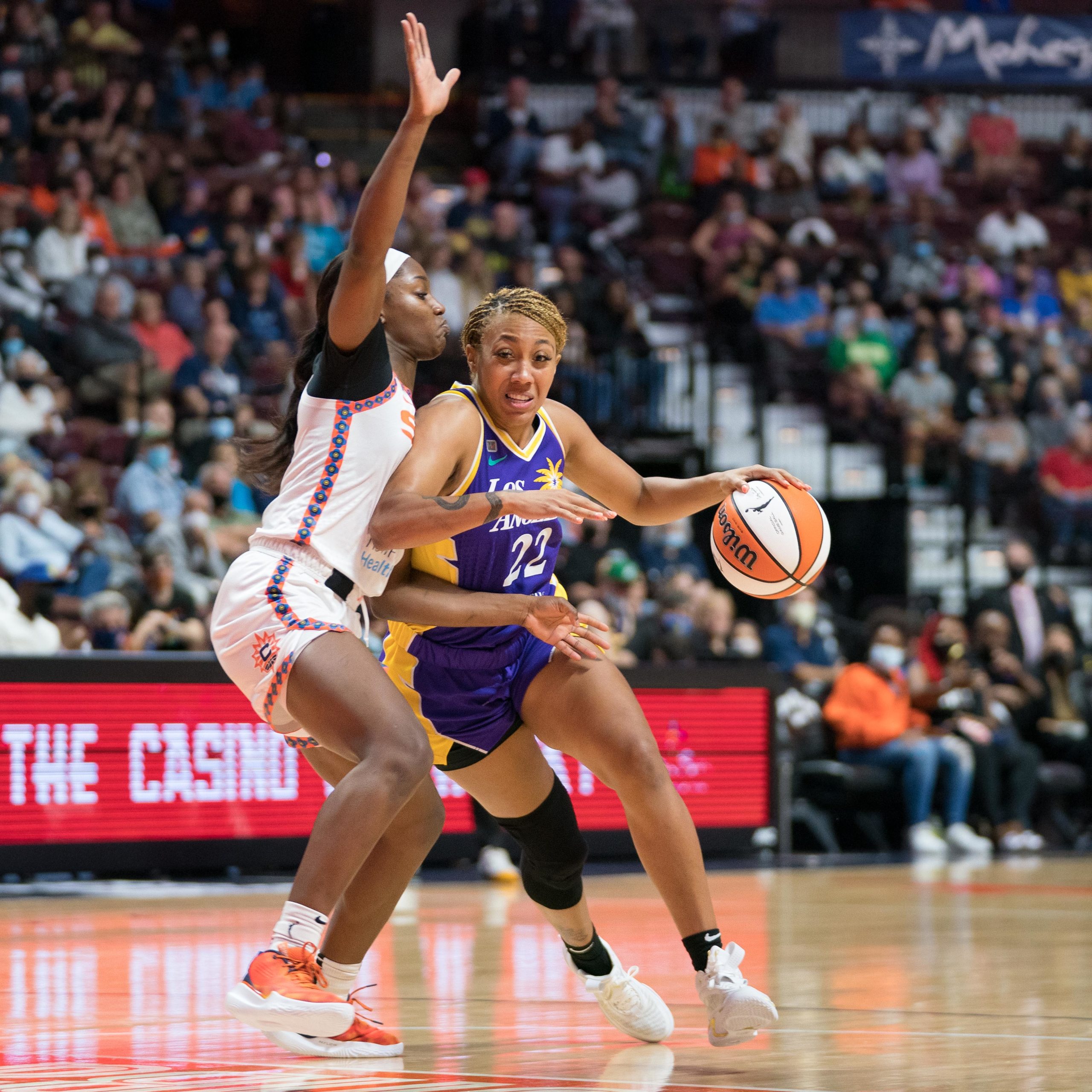 Los Angeles Sparks guard Arella Guirantes (22) drives to the basket as Connecticut Sun guard Kaila Charles (3) defends