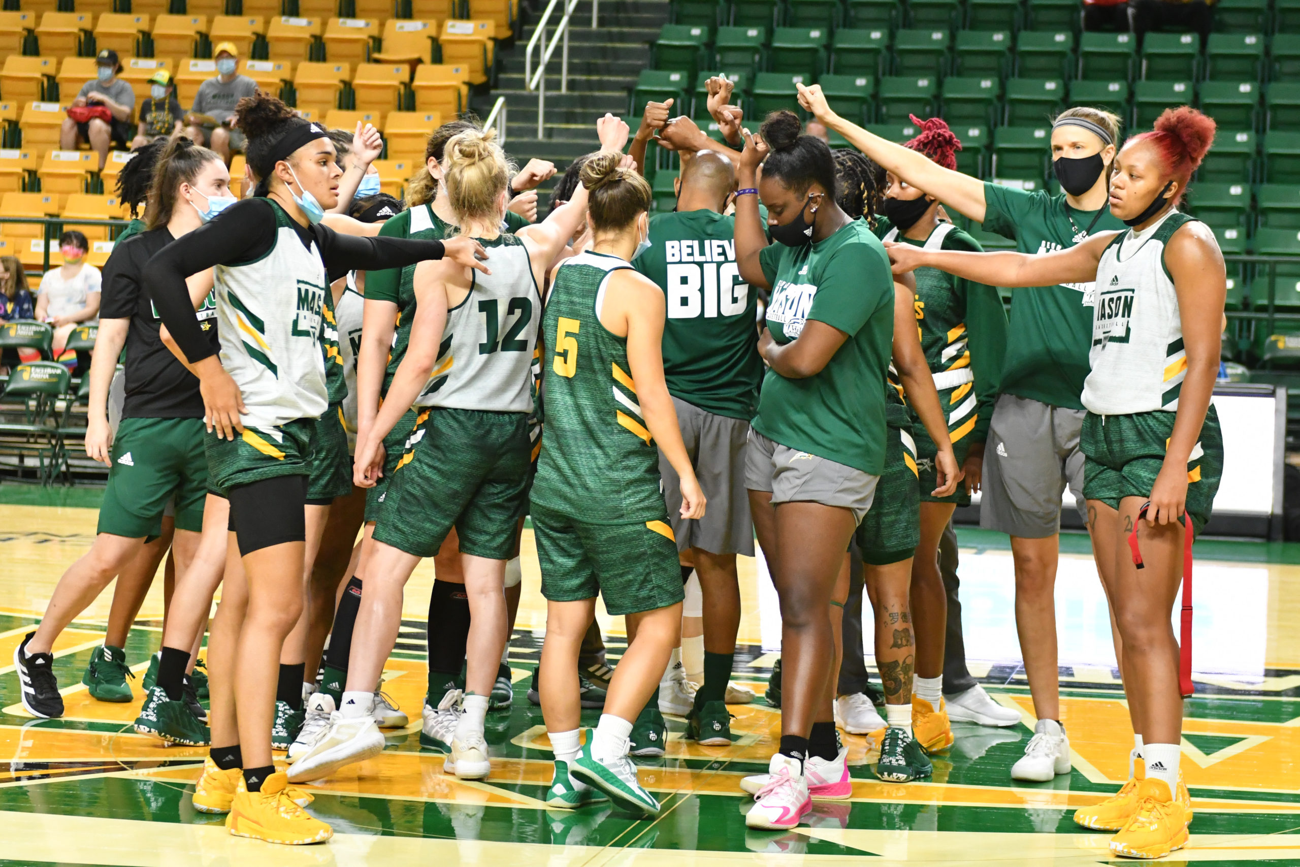 George Mason women's basketball huddle after the open practice
