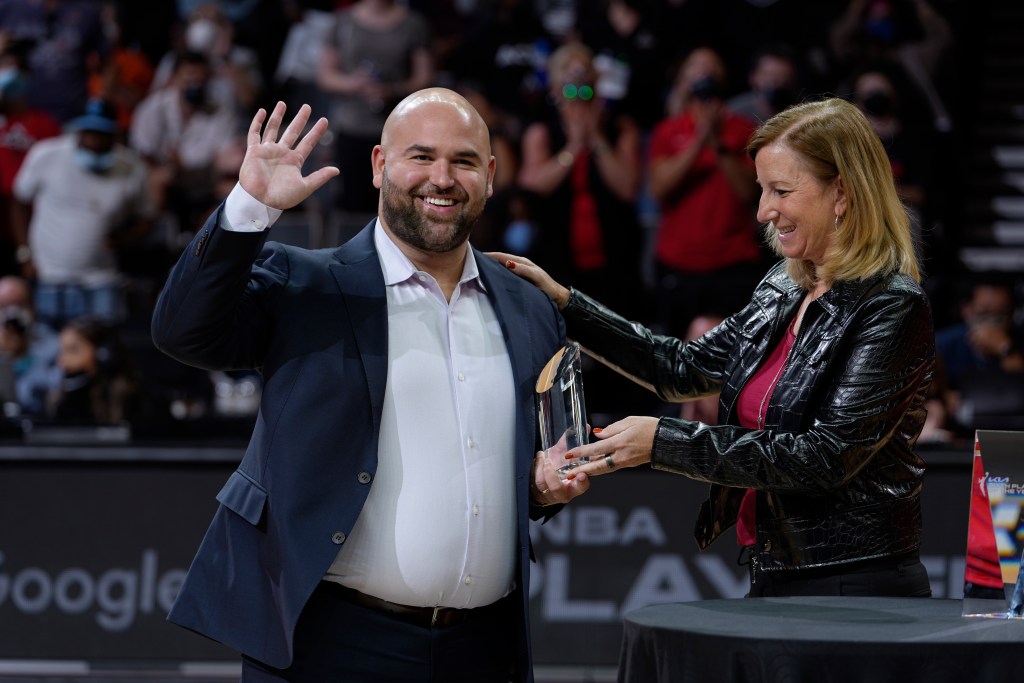 LAS VEGAS, NV - SEPTEMBER 30: WNBA Commissioner, Cathy Engelbert awards Las Vegas Aces General Manager of Basketball Operations, Dan Padover the 2021 WNBA Basketball Executive of the Year Award before the game against the Phoenix Mercury during Game Two of the 2021 WNBA Semifinals on September 30, 2021 at Michelob ULTRA Arena in Las Vegas, Nevada. NOTE TO USER: User expressly acknowledges and agrees that, by downloading and or using this photograph, User is consenting to the terms and conditions of the Getty Images License Agreement. Mandatory Copyright Notice: Copyright 2021 NBAE (Photo by Jeff Bottari/NBAE via Getty Images)