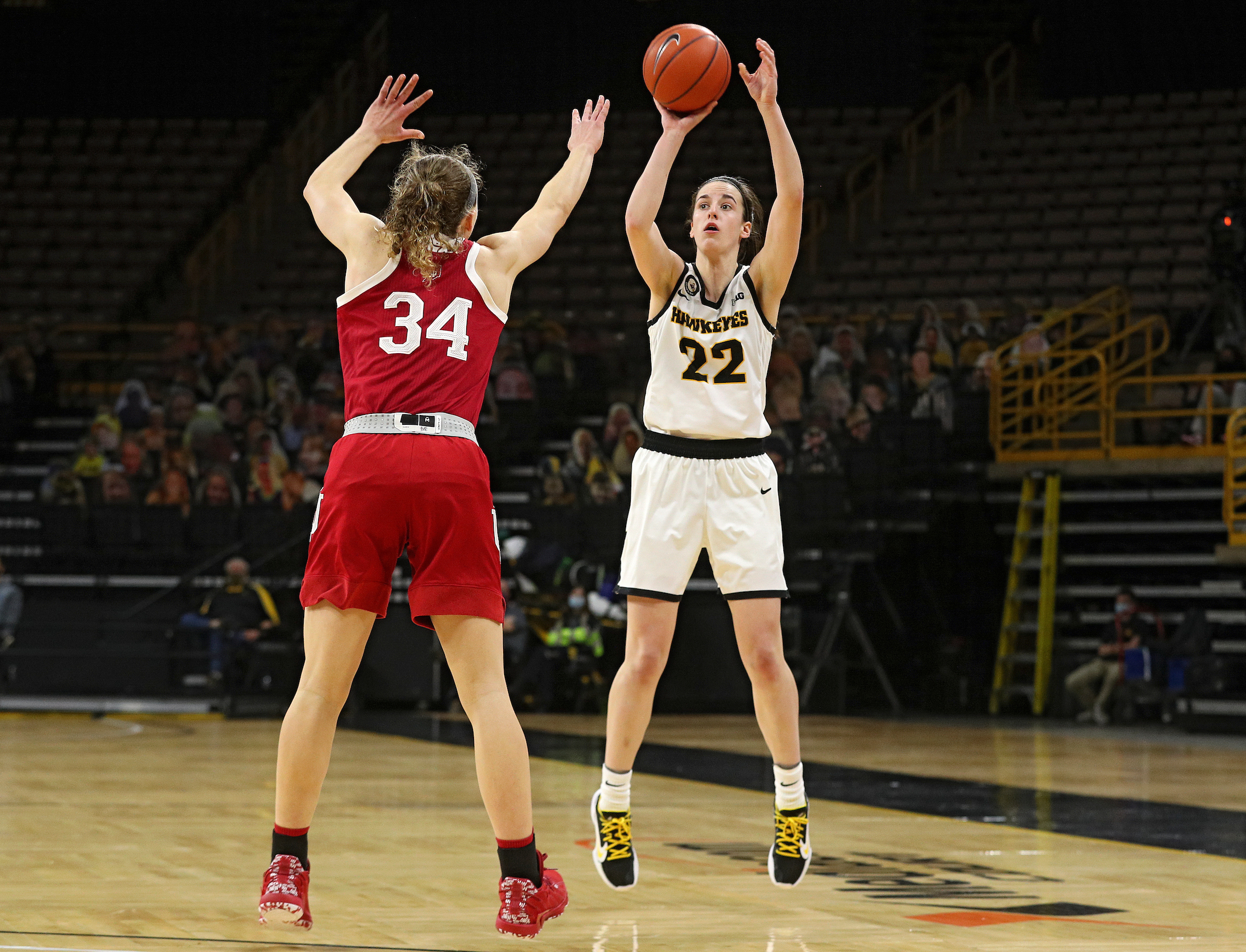 Iowa Hawkeyes guard Caitlin Clark (22) makes a 3-pointer during the second quarter of their game at Carver-Hawkeye Arena in Iowa City, IA on Sunday, February 7, 2021. (Stephen Mally/hawkeyesports.com)