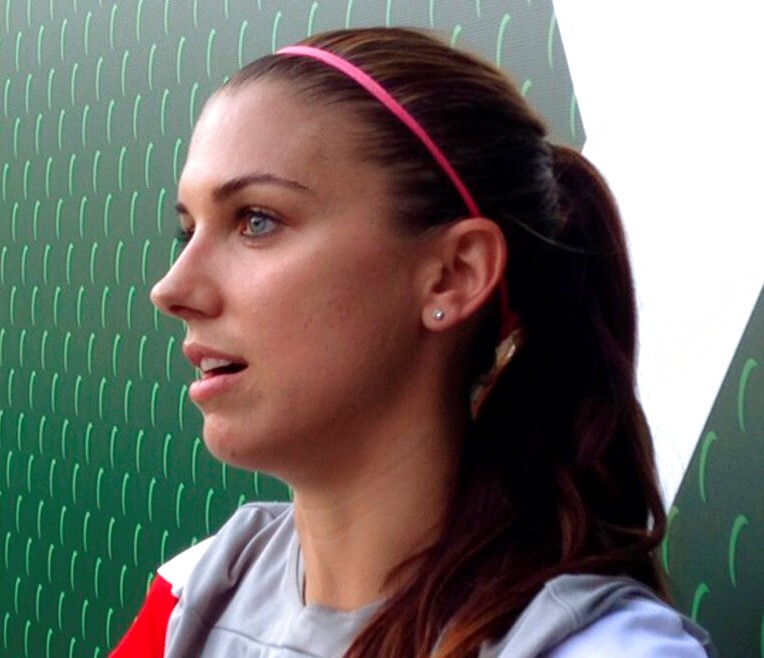 Portland Thorns forward Alex Morgan speaks with reporters at Providence Park in Portland, Ore., Wednesday, Aug. 26, 2015. Morgan is healed from injuries and a minor surgical procedure as she looks forward to the World Cup-winning U.S. national teams next goal: the 2016 Olympics. (AP Photo/Anne Peterson)