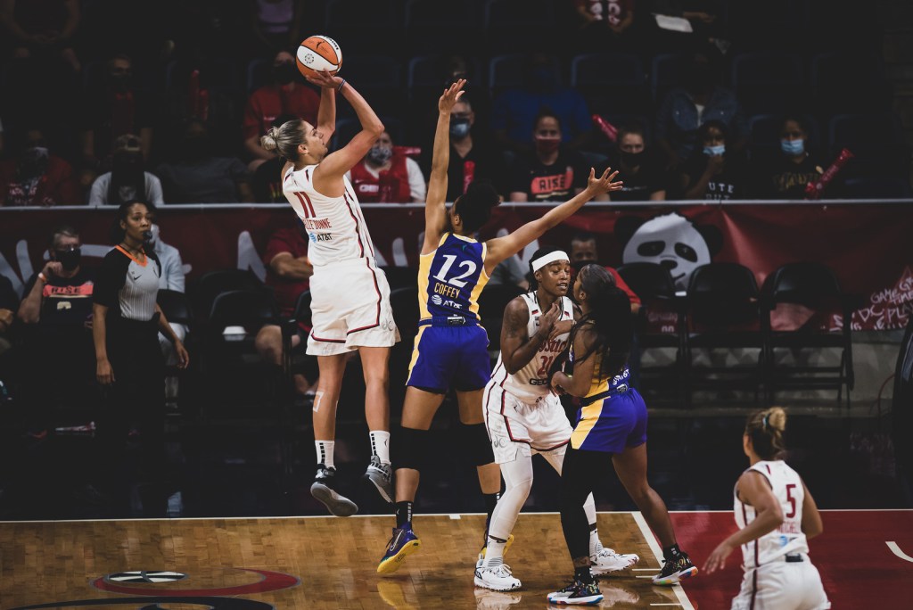 Los Angeles Sparks forward Nia Coffey playing defense