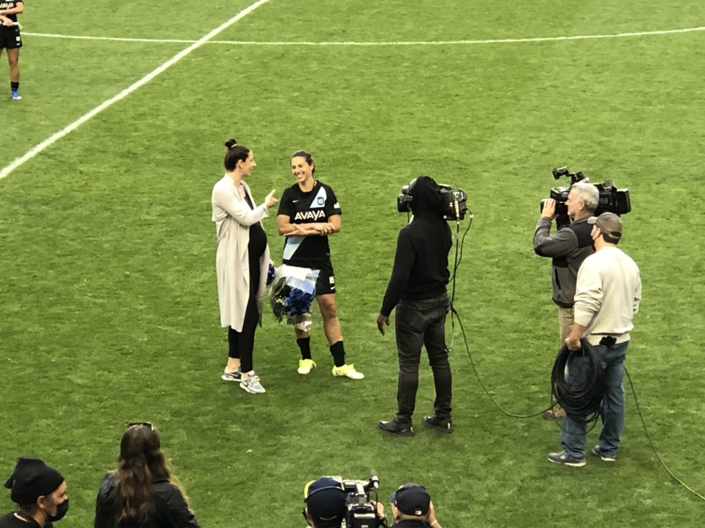 Yael Averbuch West and Carli Lloyd. (Howard Megdal photo)
