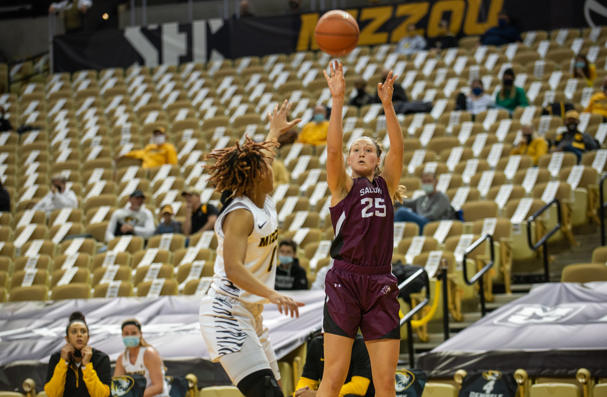 Abby Brockmire shoots a long jumper over a Missouri defender.