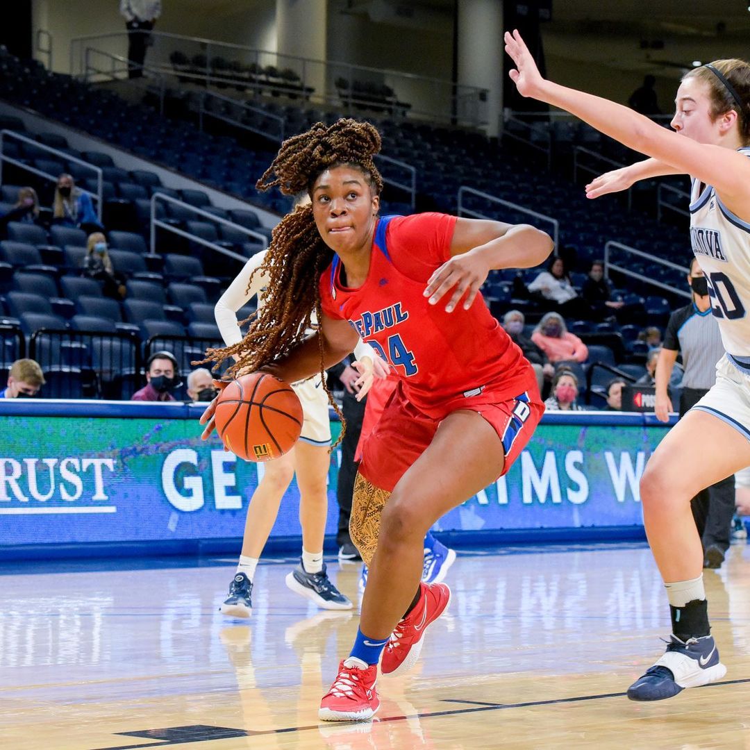 Annesah Morrow dribbles around a defender into a layup