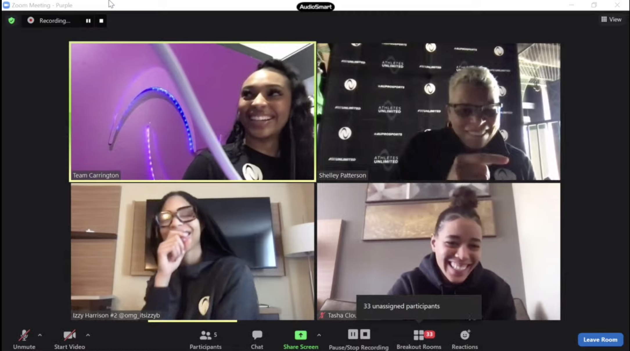 Natasha Cloud (bottom right) smiles after being selected by DiJonai Carrington (top left) eighth overall in the inaugural Athletes Unlimited basketball draft on Jan. 23, 2022. (Screenshot from the YouTube.com livestream)