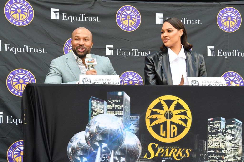 Derek Fisher and Liz Cambage. (Andrew D. Bernstein/NBAE)