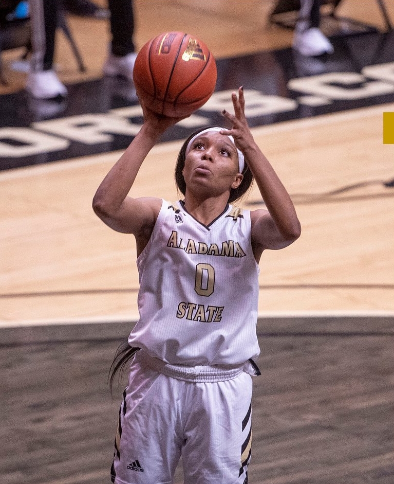 Ayana Emmanuel releases a short jumper in midair