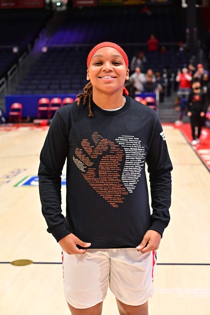 Araion Bradshaw models the Black History Month t-shirts she designed.