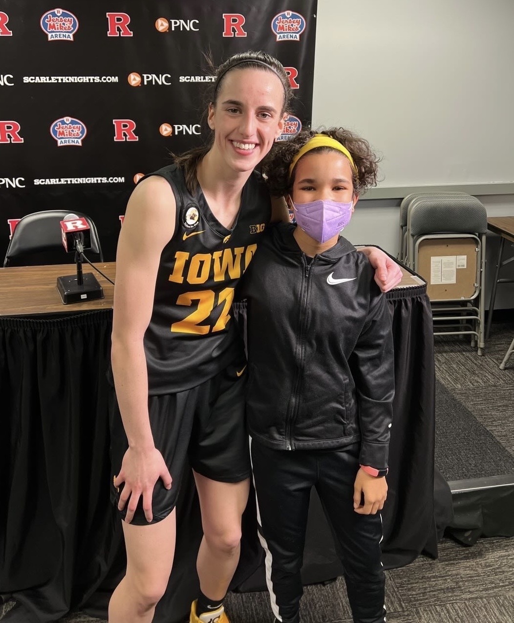 A picture of podcaster Pepper with Iowa guard Caitlin Clark