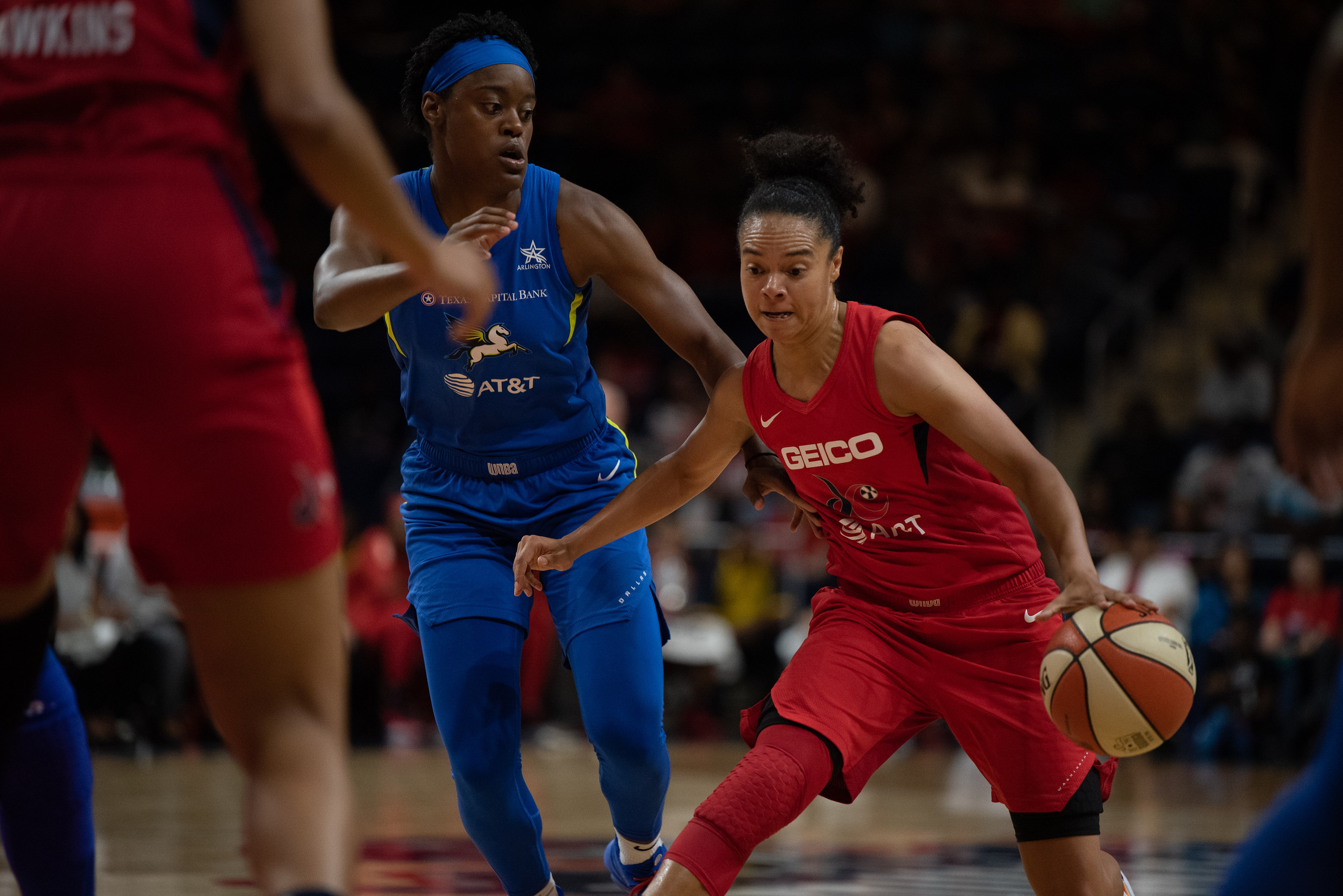 Dallas Wings forward Kaela Davis defends Kristi Toliver driving towards the basket (Photo Credit: Domenic Allegra).