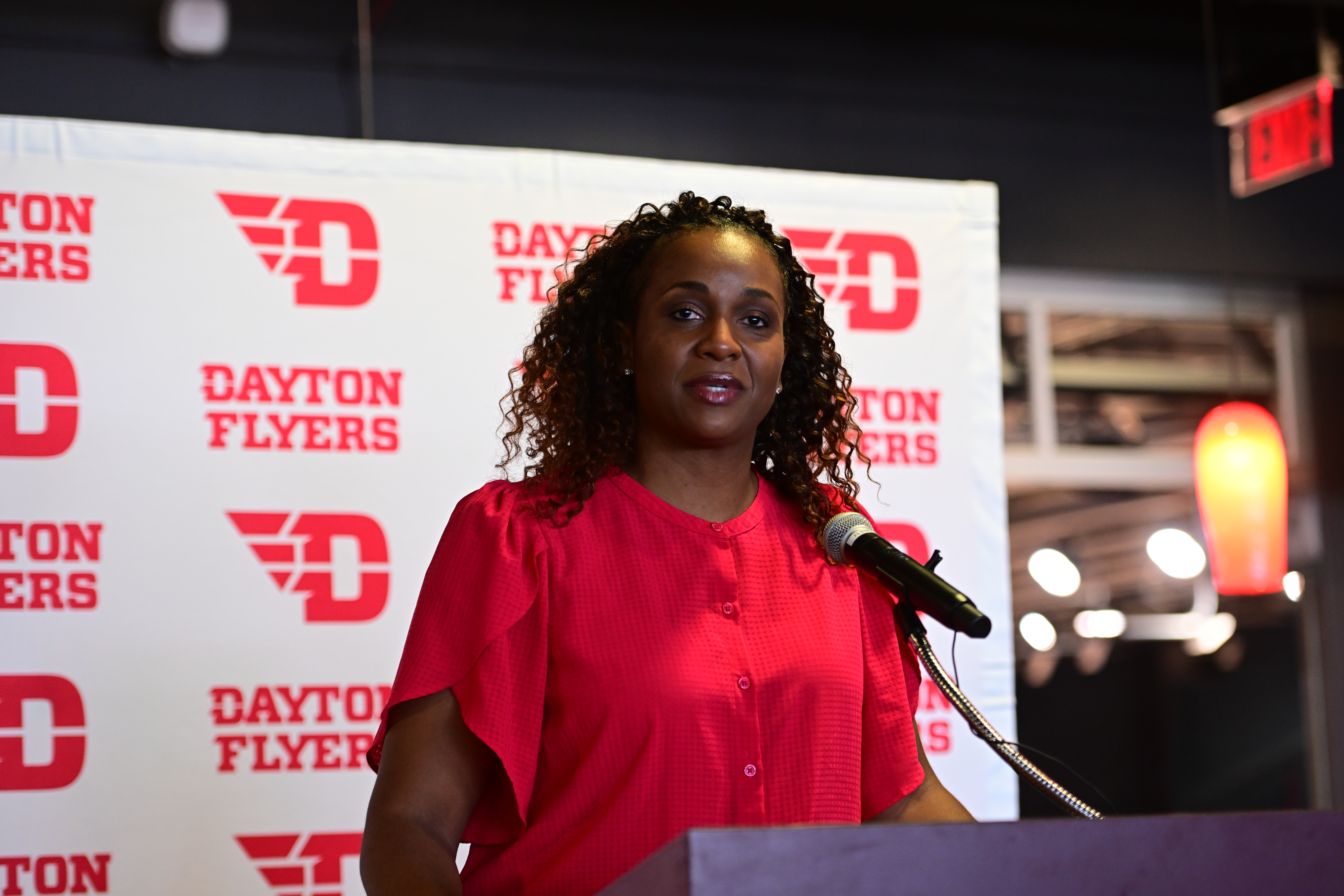 Tamika Williams-Jeter stands at the podium at her introductory press conference on March 28.