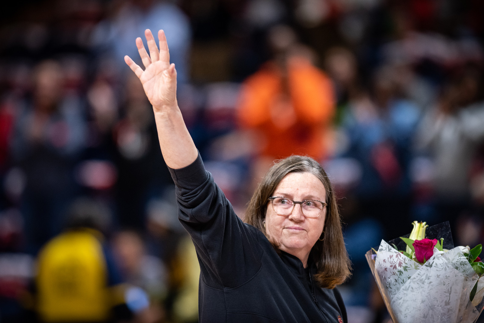 Indiana Fever head coach Marianne Stanley waves to an off-screen crowd
