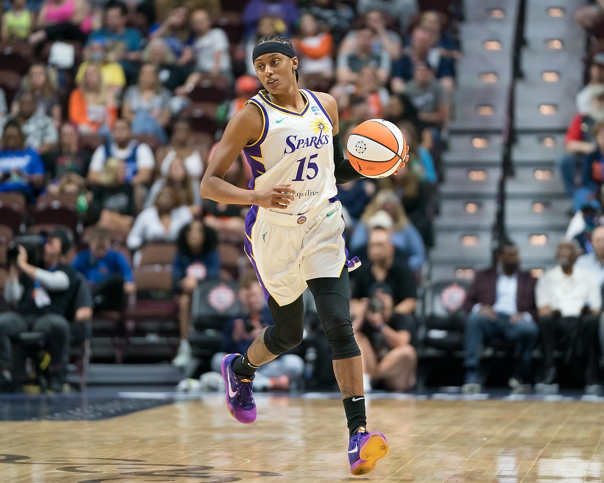 Brittney Sykes has the ball at the top of her dribble, while walking up the court