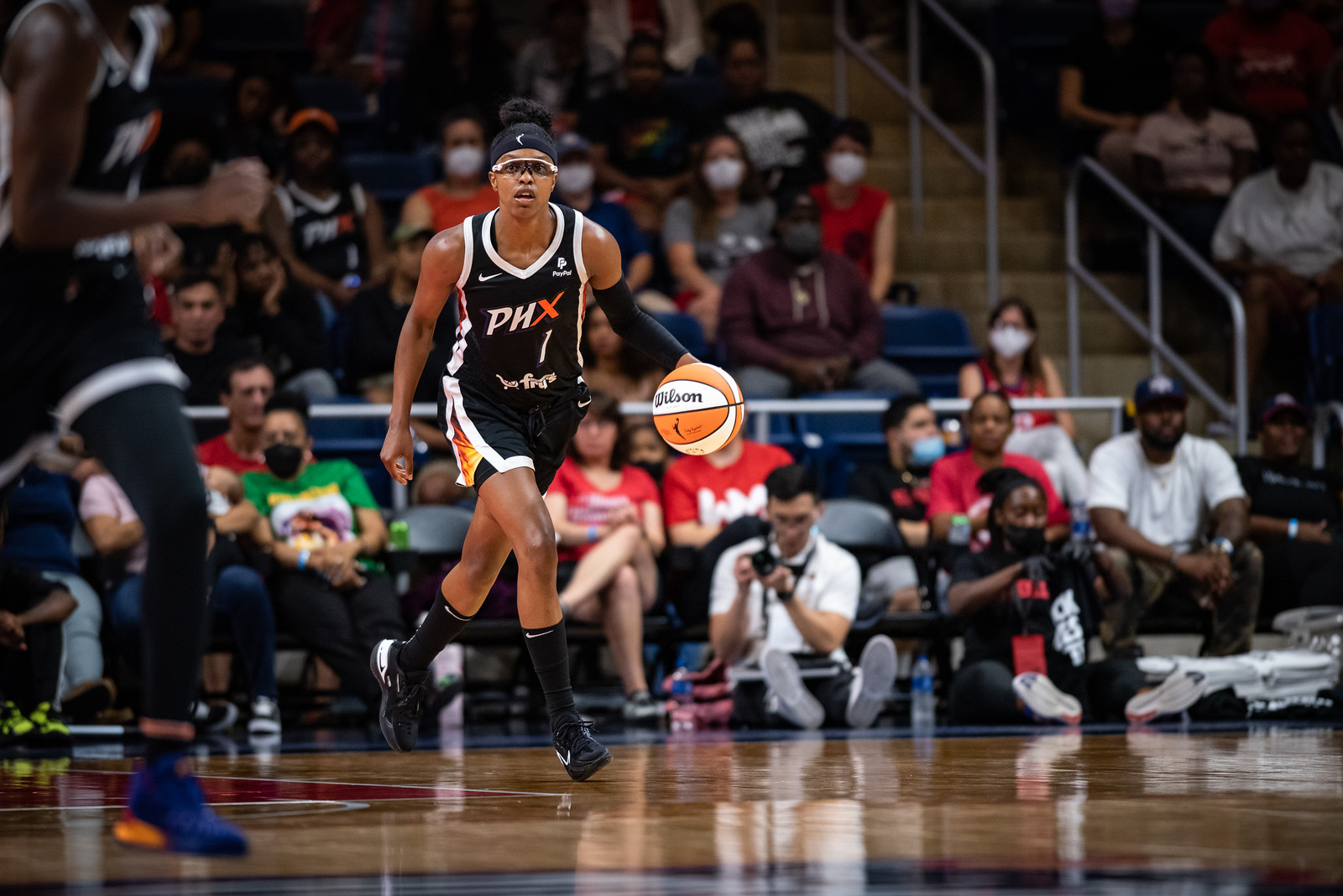 Phoenix Mercury wing Diamond DeShields dribbles from deep in the backcourt towards midcourt.