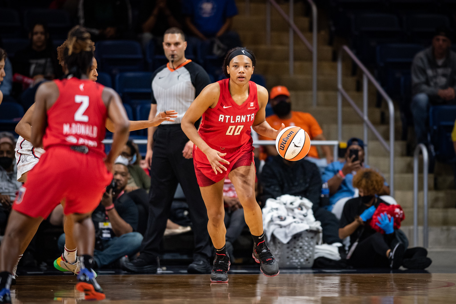 Atlanta Dream big Naz Hillmon dribbles up the court