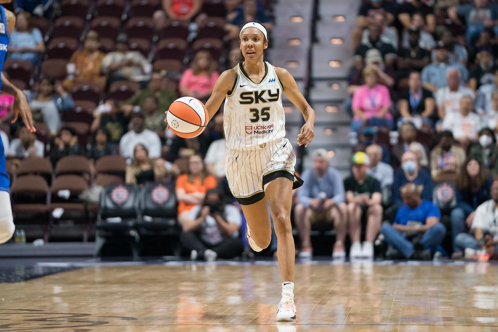 Chicago Sky combo forward Rebekah Gardner dribbles up the court past the halfcourt line