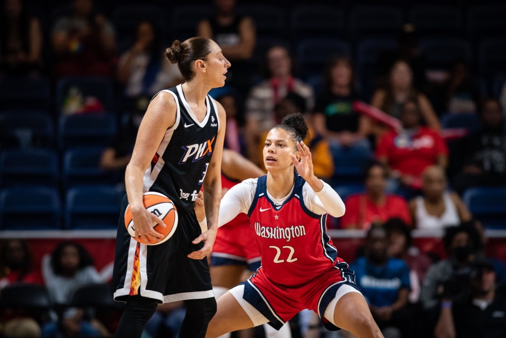 Washington Mystics wing Alysha Clark (22) defends Phoenix Mercury guard Diana Taurasi (3) during a game at the Entertainment and Sports Arena in Washington, D.C., on June 14, 2022. (Photo credit: Domenic Allegra)