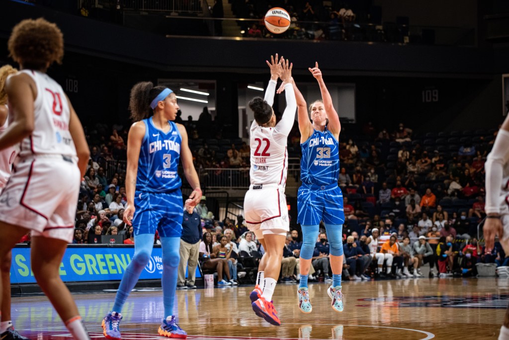 Washington Mystics wing Alysha Clark (22) contests a shot by Chicago Sky forward Emma Meesseman (33) during a game at the Entertainment and Sports Arena in Washington, D.C., on June 8, 2022. (Photo credit: Domenic Allegra)