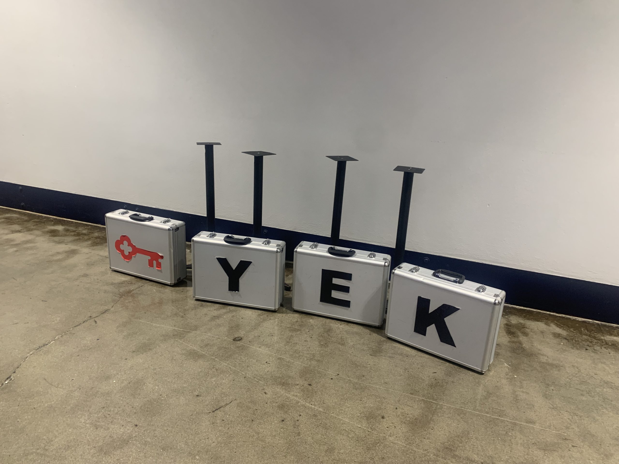 The four cases used for Deal or No Deal at Indiana Fever games are labeled with a “K,” “E,” “Y” and a key symbol, as KeyBank sponsors the event.