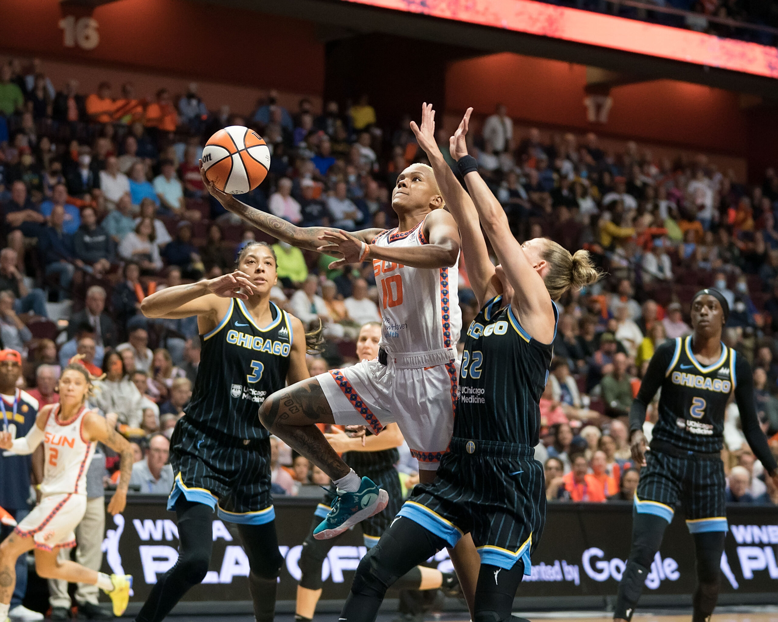 Chicago Sky guard Courtney Williams is pictured driving to the basket as a member of her former team, the Connecticut Sun.