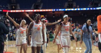 The Connecticut Sun celebrate as they come off the court following Game 4's win over the Chicago Sky, September 6, 2022. (Howard Megdal photo)