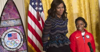 Michelle Obama with Simone Biles at a White House ceremony for Rio Olympians in 2017