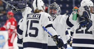 Penn State hockey players celebrate during a recent victory over Wisconsin. pwhpa