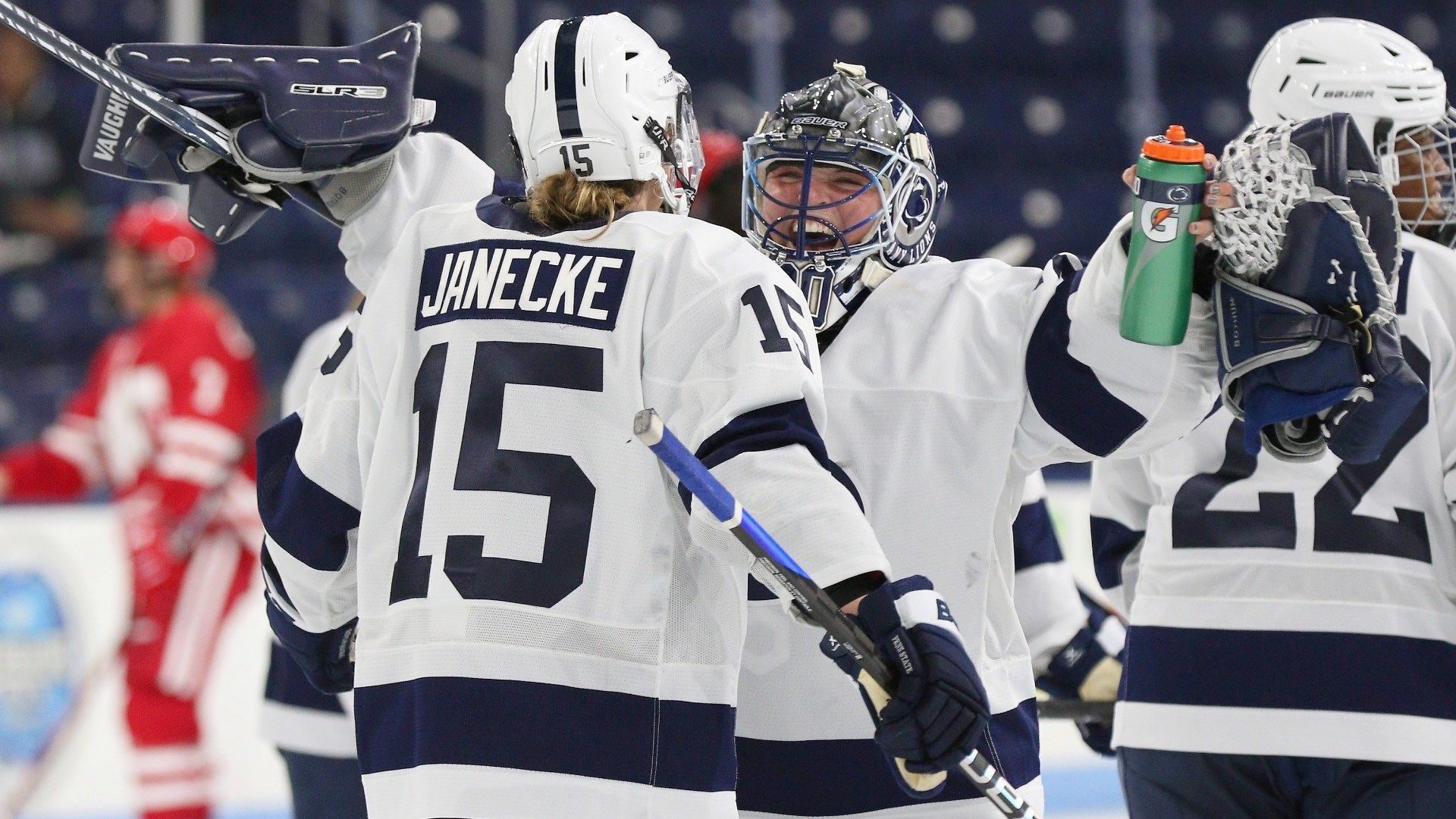 Penn State hockey players celebrate during a recent victory over Wisconsin. pwhpa