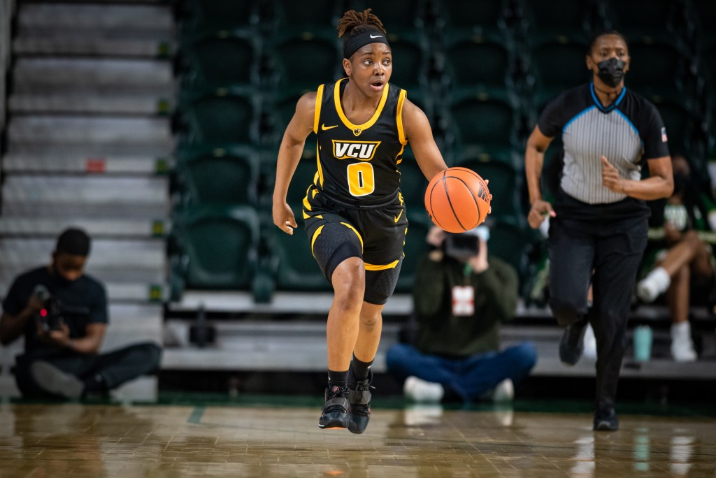 Sarah Te-Biasu brings the ball up the court against George Mason on February 19, 2022.