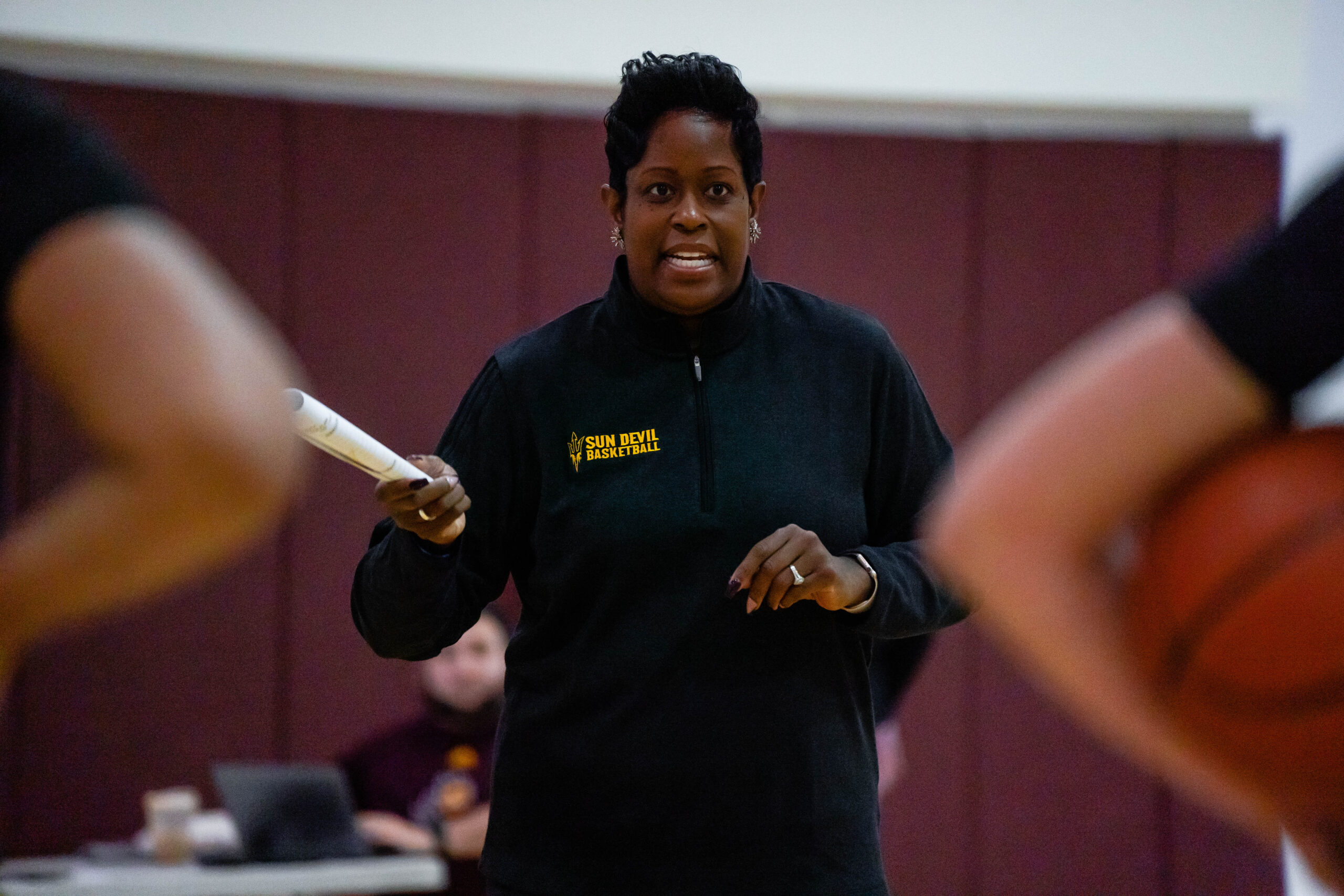ASU coach Natasha Adair running her teaam's practice