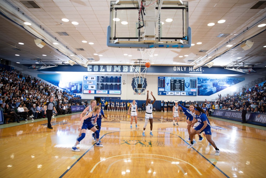 Columbia guard Jaida Patrick shoots a free throw as six Columbia and Seton Hall players box out on the lane lines