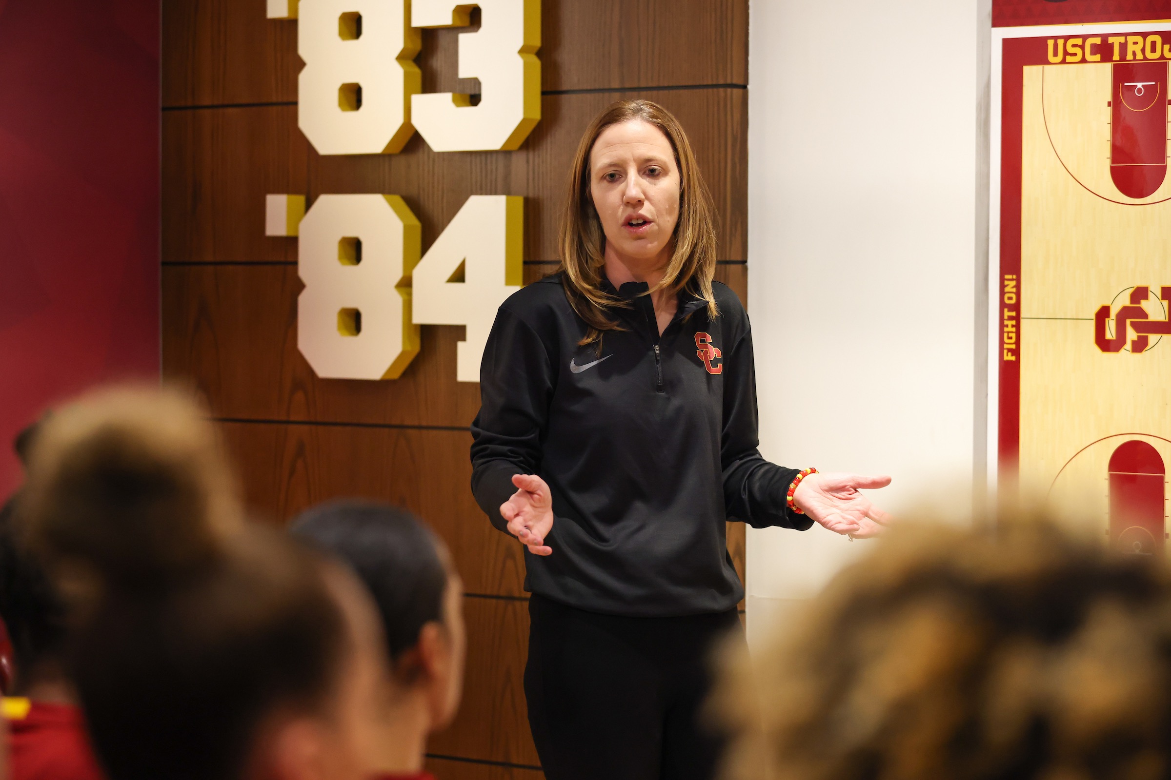 USC coach Lindsay Gottlieb speaks to her team in the locker room at halftime.