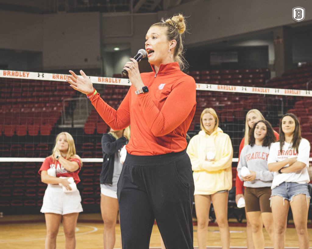 Kate Popovec-Goss addresses fans in attendance for a Bradley volleyball game in September to get them excited for women's basketball season.