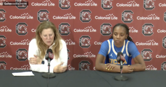 Cori Close and Charisma Osborne of UCLA speak to the media following a 73-64 loss to South Carolina. (Photo via UCLA Athletics)