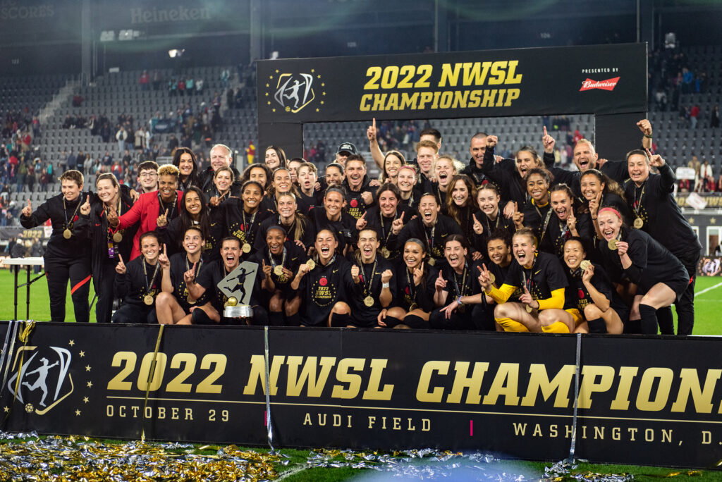 The Portland Thorns celebrate their 2022 NWSL Championship at Audi Field in Washington D.C. (Photo credit: Domenic Allegra)