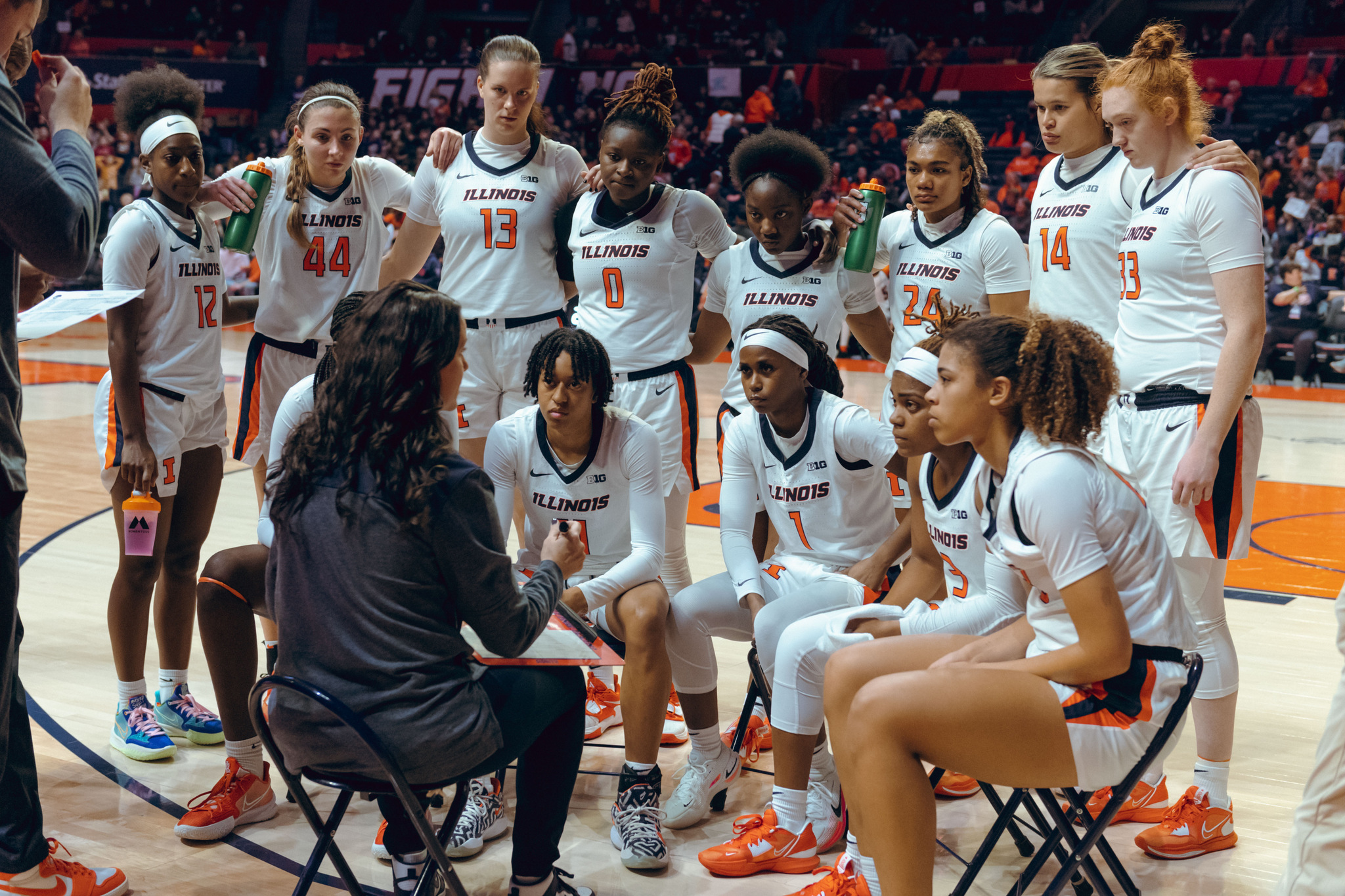 Illinois head coach Shauna Green talks with her team during a game in mid-November.
