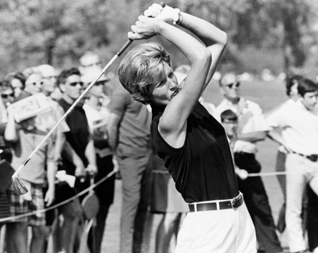 Kathy Whitworth follows through after a shot in the $32,000 Ladies World Series of Golf in Springfield, Ohio., September 2, 1967. She and Carol Mann came home with 69s to share the first round lead in the 36 hole tourney. First prize is worth $10,000. (AP Photo)