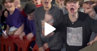 A still from a TikTok posted by Samantha Peszek showing a group of young men catcalling Livvy Dunne outside the Huntsman Arena in Salt Lake City.