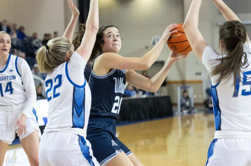 Villanova senior Maddy Siegrist gets a shot up against two Creighton defenders.