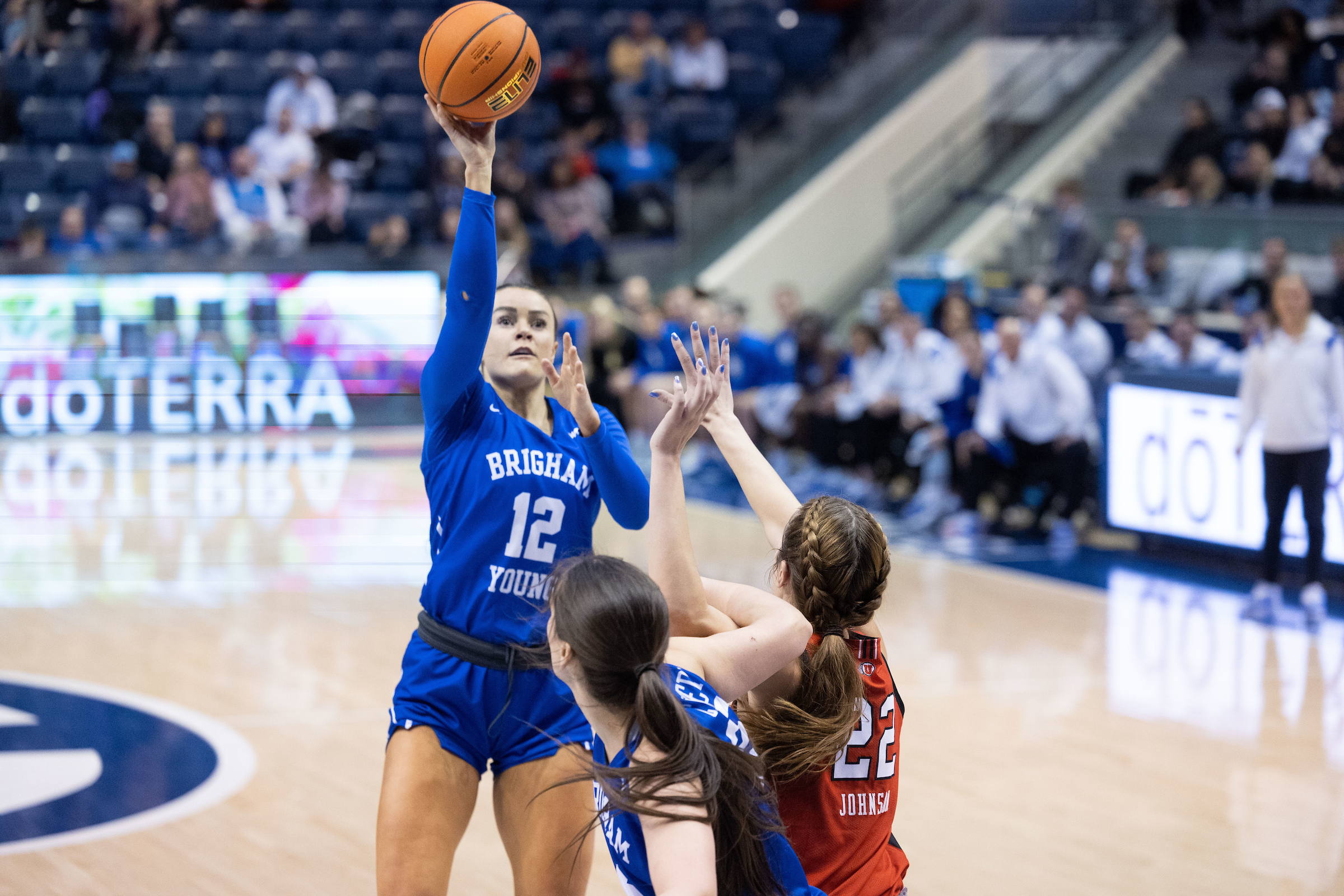 Lauren Gustin shoots a floater at home against Utah. Photo Credit: BYU Photo