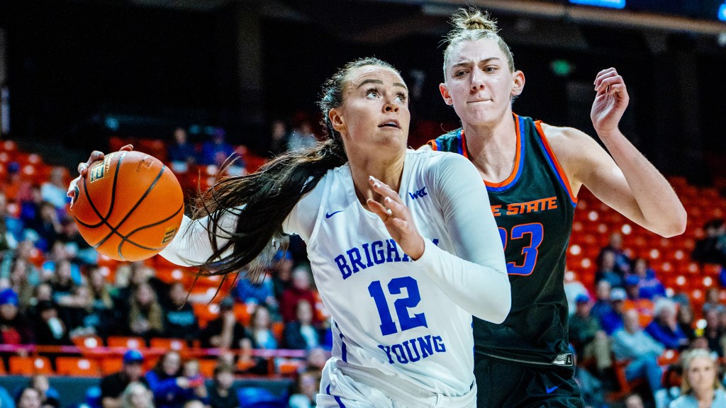 Lauren Gustin attacks the rim against Boise State. Photo Credit: BYU Photo
