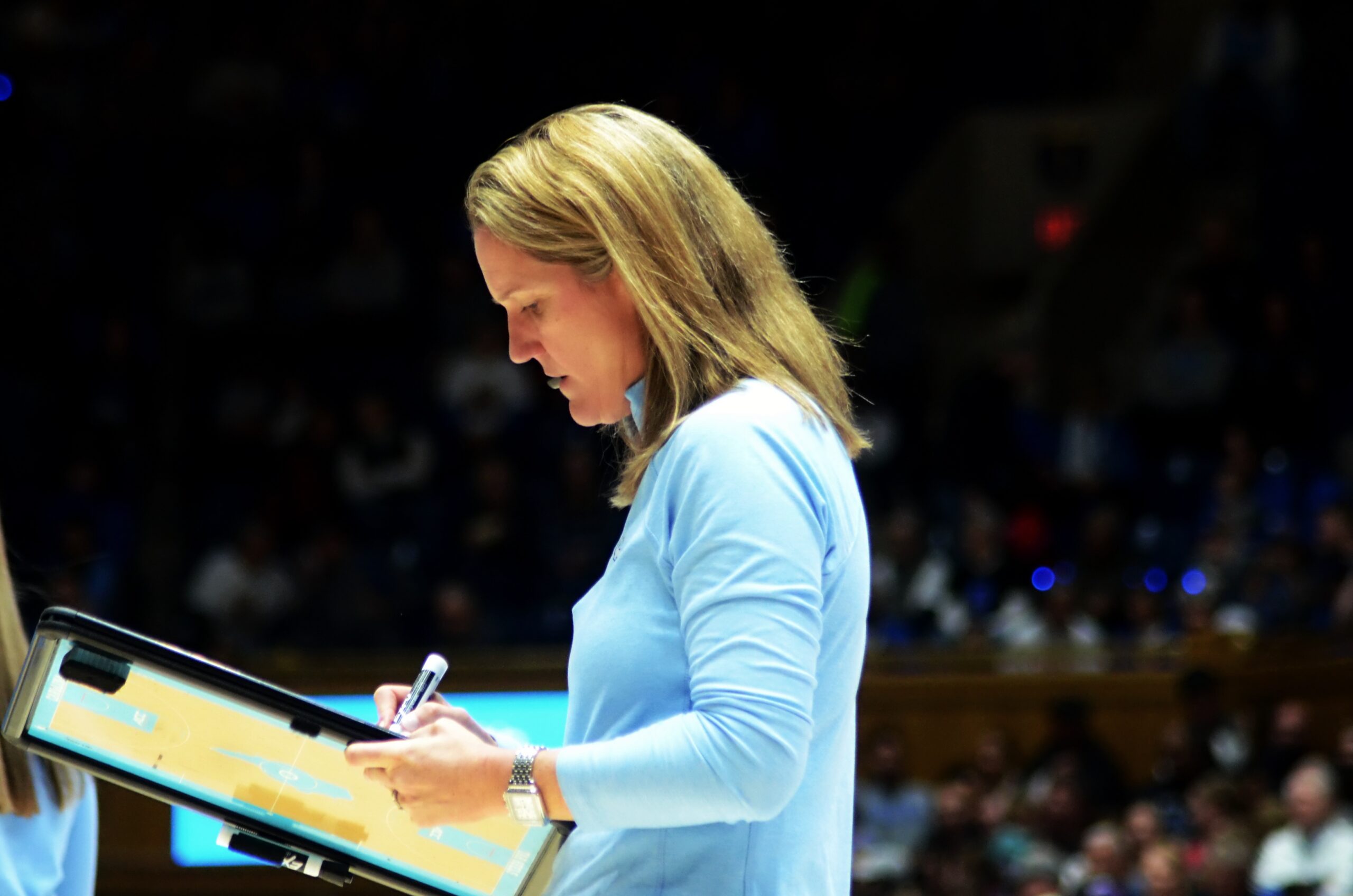 UNC head coach Courtney Banghart draws up a play during a timeout at Duke on Feb. 26, 2023. (Mitchell Northam / The Next)