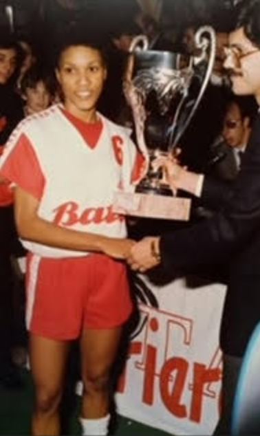 Women's Professional Basketball League (WBL) Linnell Jones-McKenney accepts a trophy.