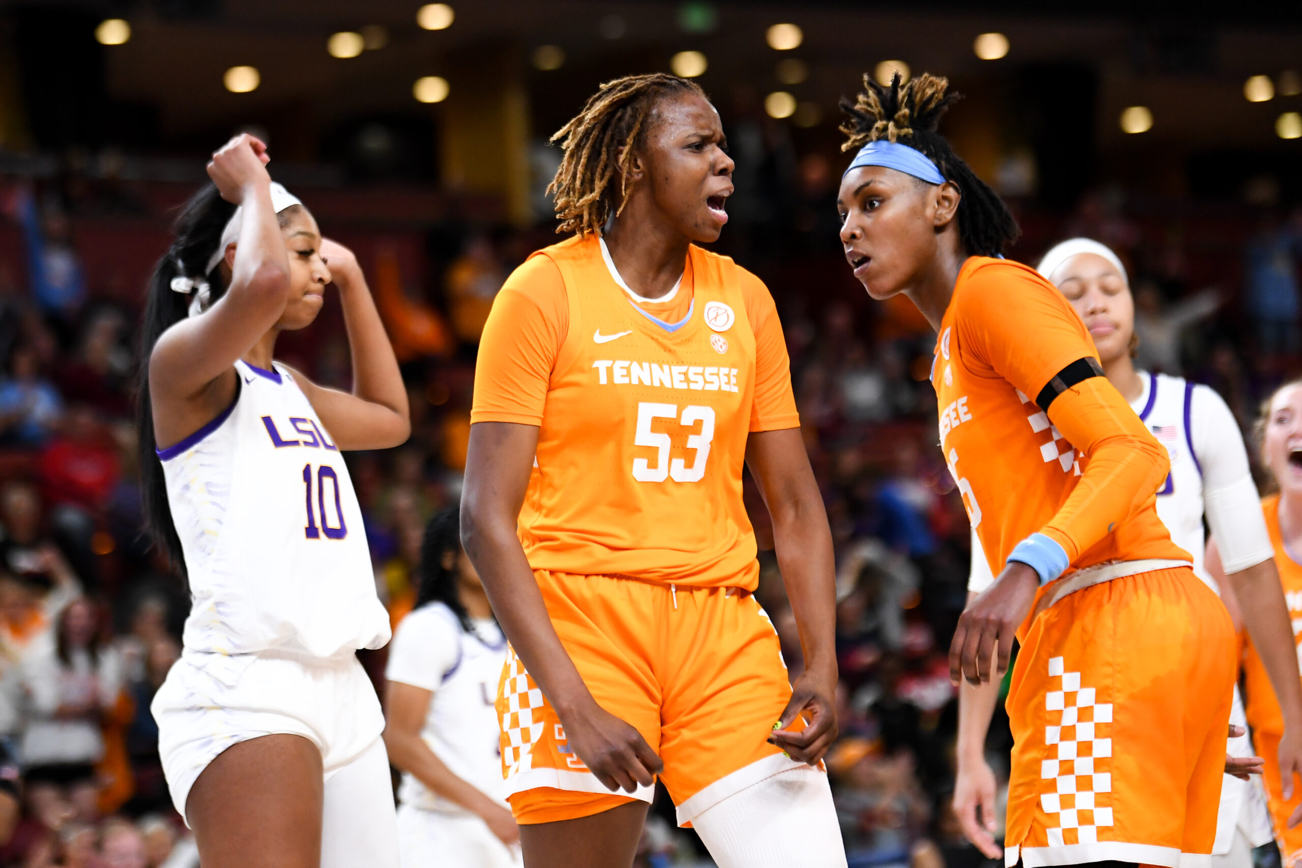 Tennessee transfer Jillian Hollingshead (53) celebrates with LSU transfer Angel Reese in the background.